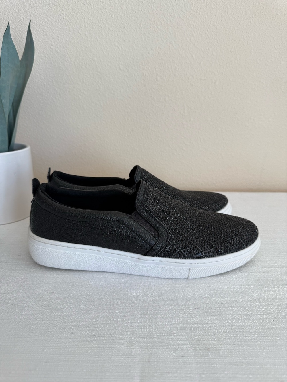 Skechers Black Slip-On Sneakers with White Sole